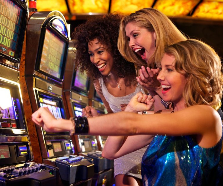 girls playing casino slots
